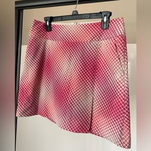 Dri Fit; plaid khaki, pink-purple; side and rear pockets